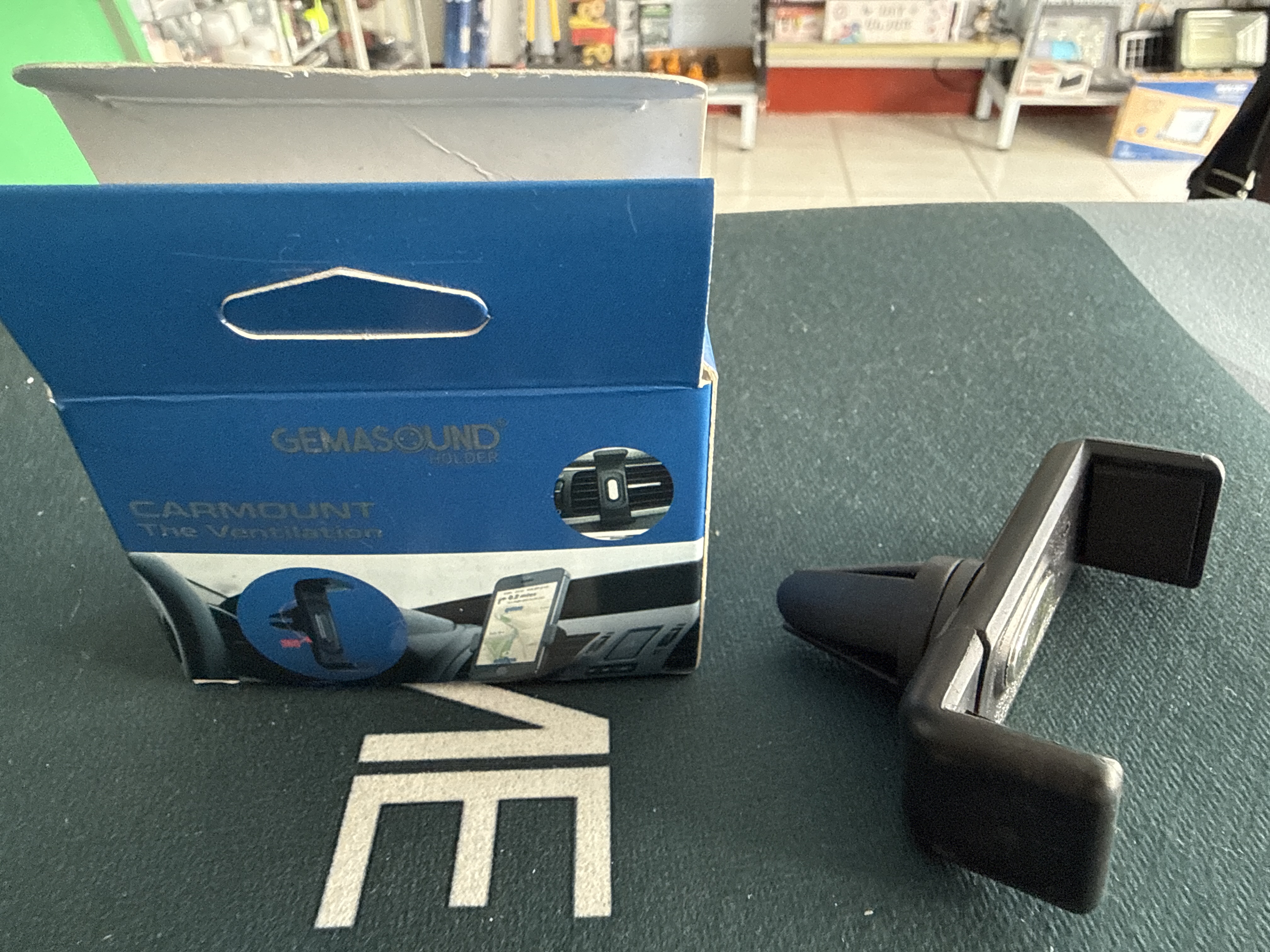 Soporte de celular para rejilla carro